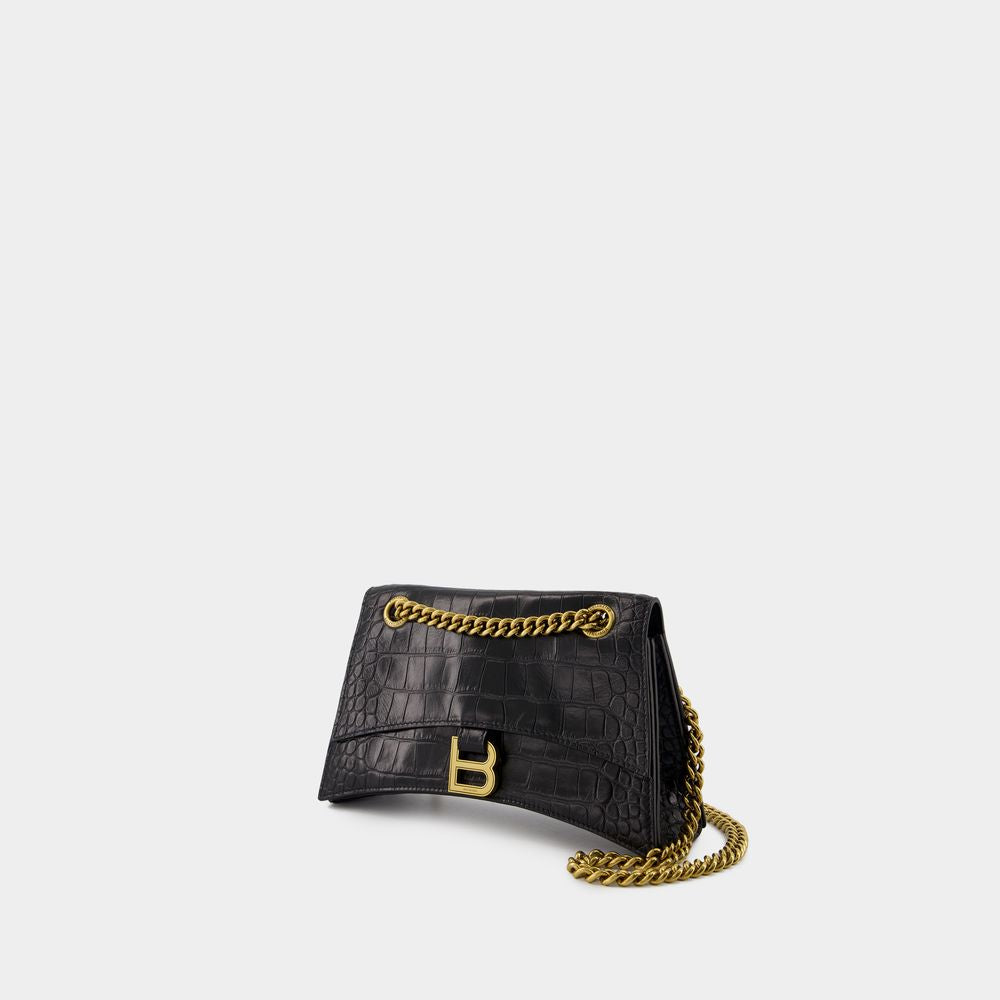 1000 BALENCIAGA BALENCIAGA CRUSH CHAIN SMALL BAG IN CROCODILE-EMBOSSED LEATHER. 
DIMENSIONS: L24.9 X H14 X W7.9 CM. 
49.8 CM LONG CHAIN SHOULDER STRAP. 
CURVILINEAR BOTTOM. 
AGED GOLD FINISH. 
STUDDED MAGNET