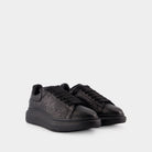 1000 ALEXANDER MCQUEEN OVERSIZED SNEAKERS 