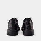 1000 ALEXANDER MCQUEEN OVERSIZED SNEAKERS 