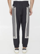 EJB BALMAIN MONOGRAM SCARF TRACK PANTS