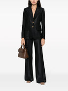 065001 CHLOÉ WOOL AND SILK BLEND FLARED LEG TROUSERS