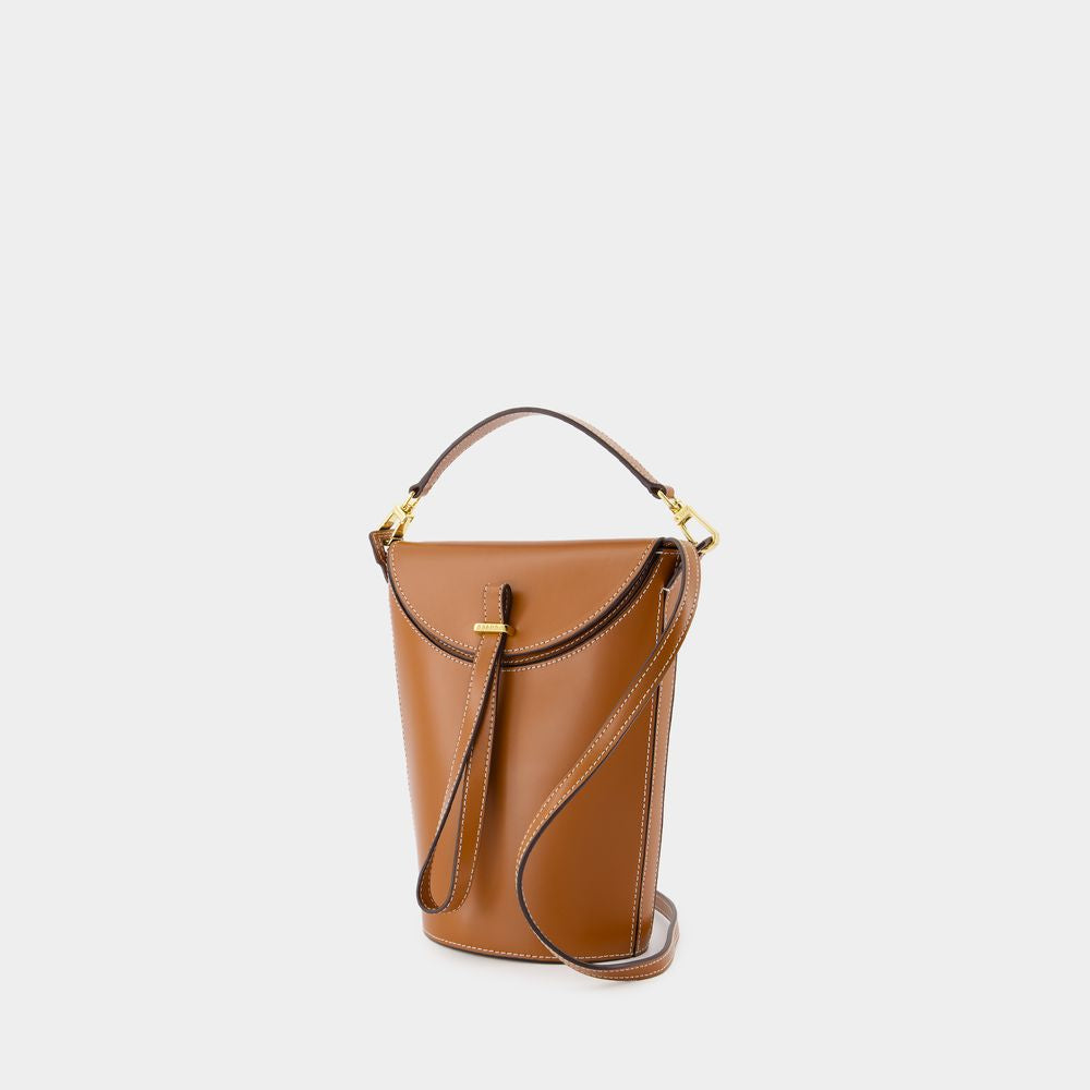 New Leather Staud bucket bag in factory Brown color