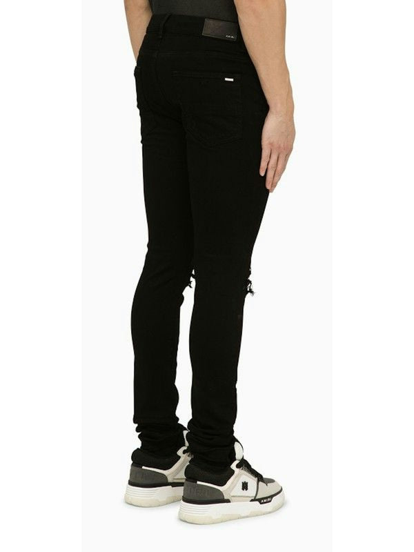 018 AMIRI  BLACK SKINNY JEANS WITH CAMOUFLAGE PATCHES