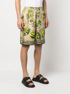 5G530 VERSACE Le Maschere print silk shorts