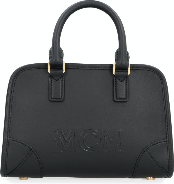 Mcm black mini online bag